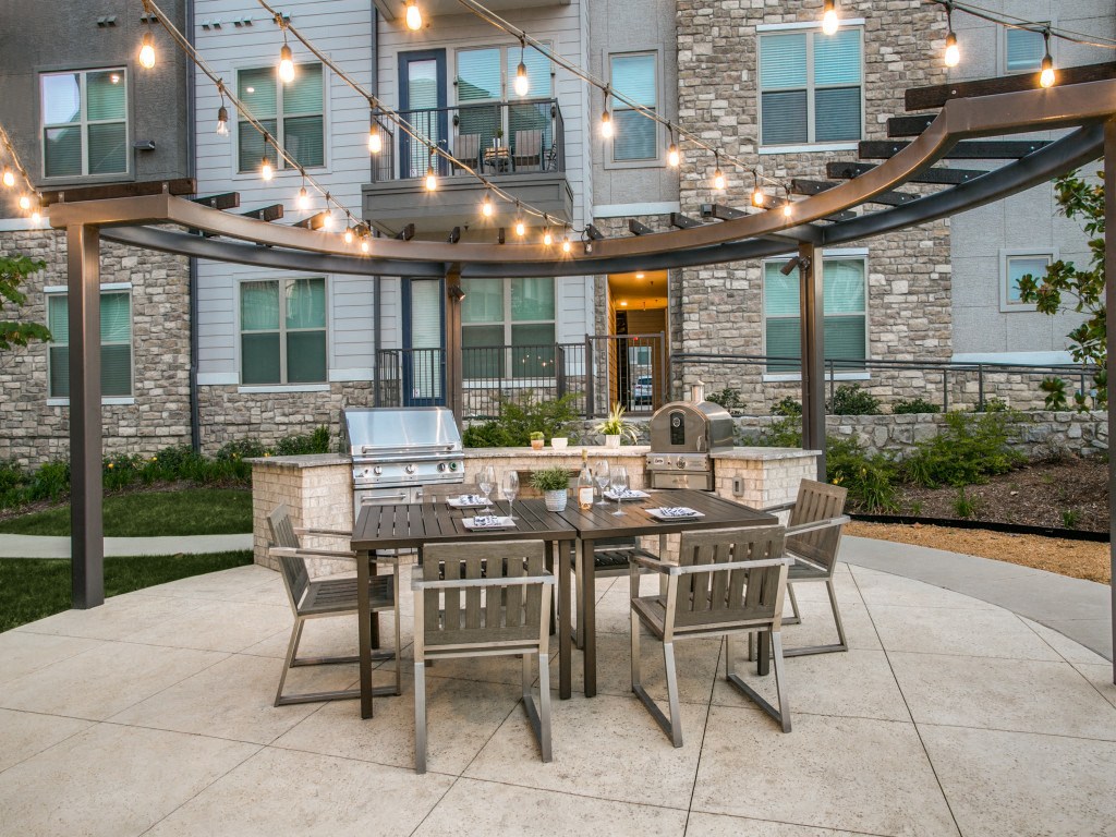Outdoor grills with dining patio